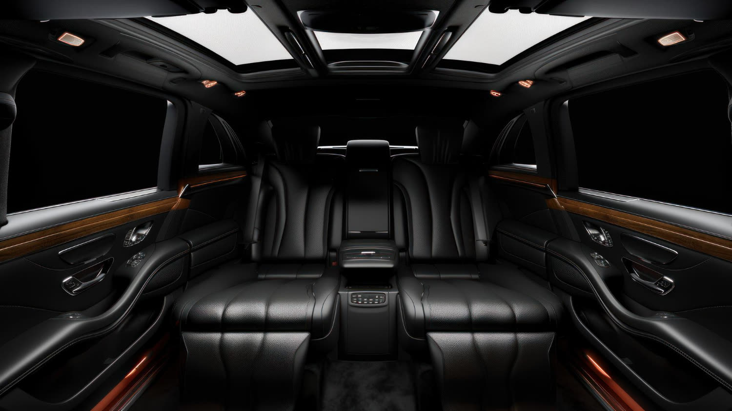 Rear cabin of a luxury saloon, quilted leather and ambient lighting